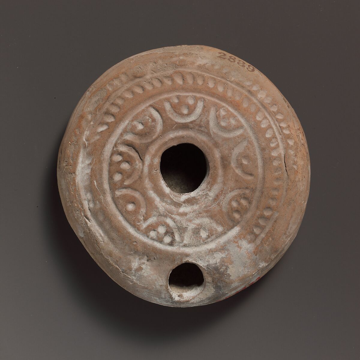 Terracotta oil lamp, Terracotta, Roman 