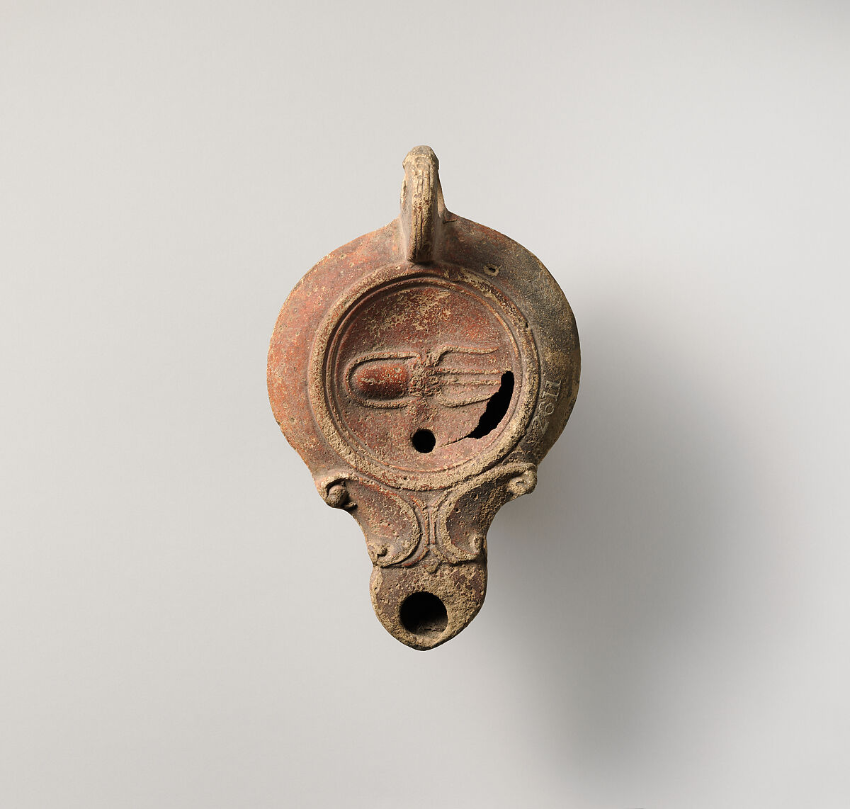 Terracotta oil lamp, Terracotta, Roman 