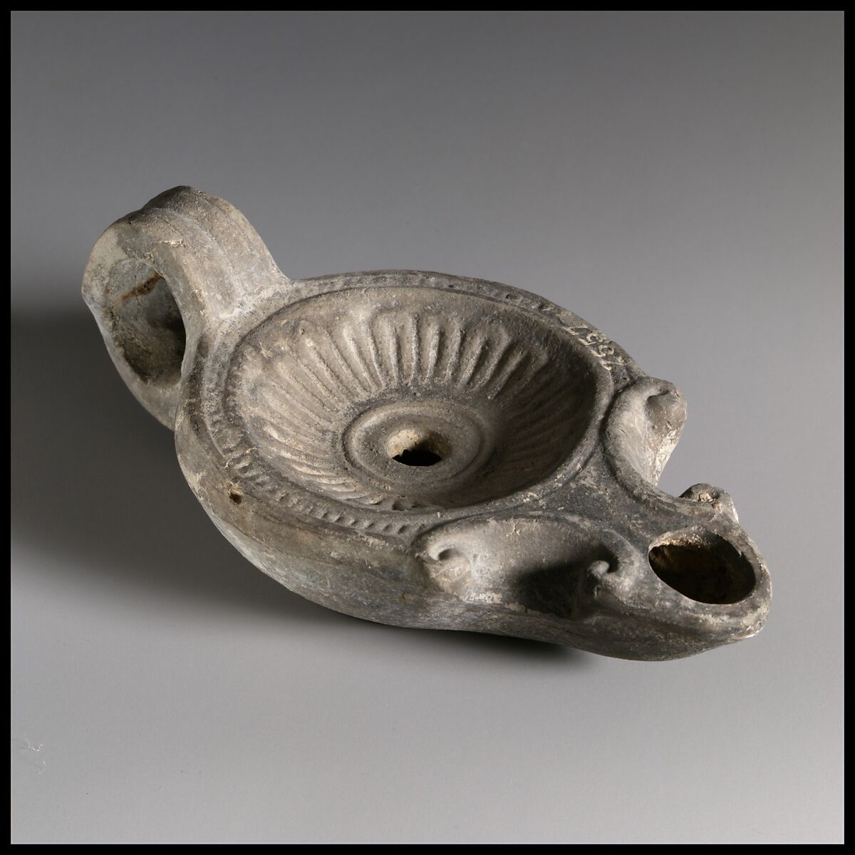 Terracotta oil lamp, Terracotta, Roman