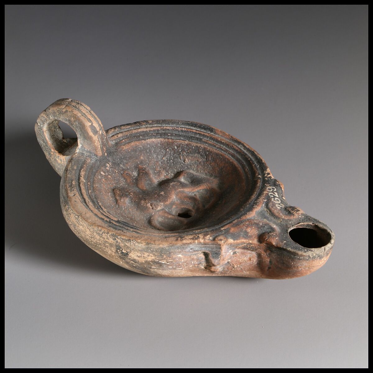 Terracotta oil lamp, Terracotta, Roman