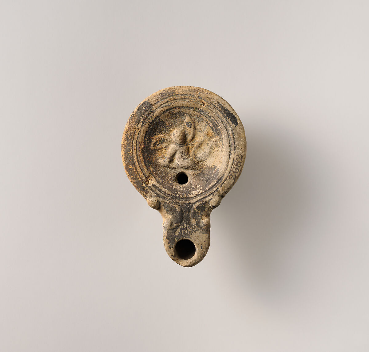 Terracotta oil lamp, Terracotta, Roman 