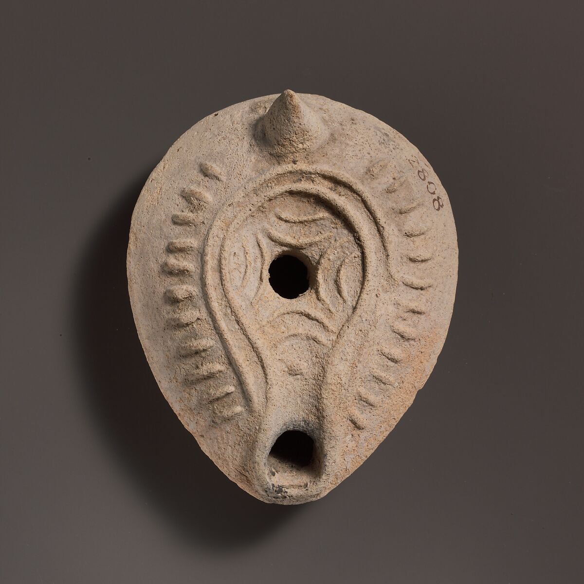 Terracotta oil lamp, Terracotta, Roman 