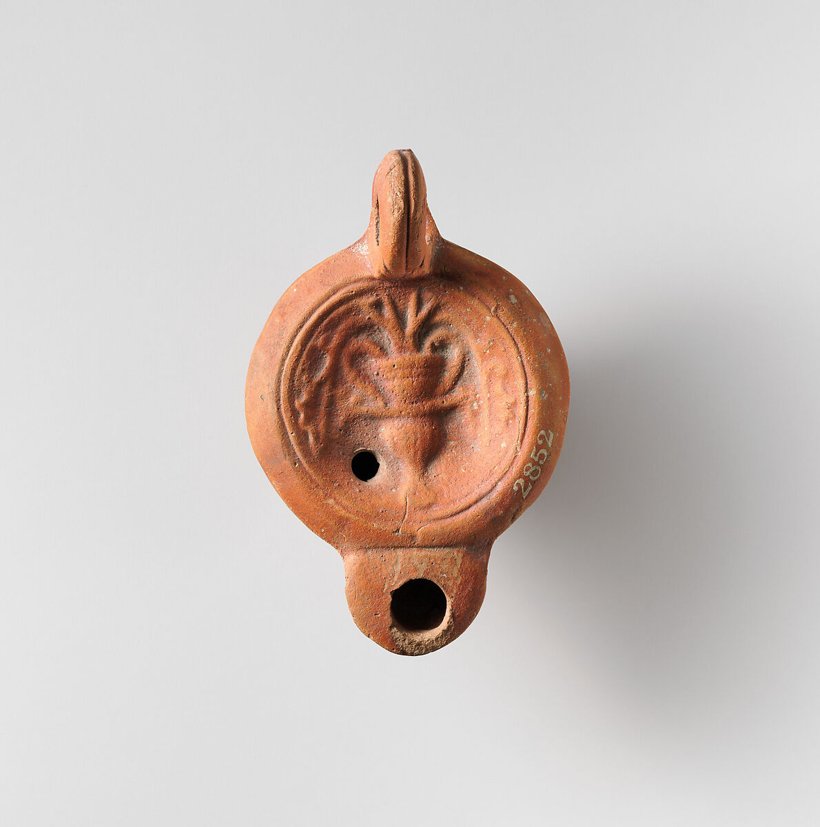 Terracotta oil lamp, Terracotta, Roman 