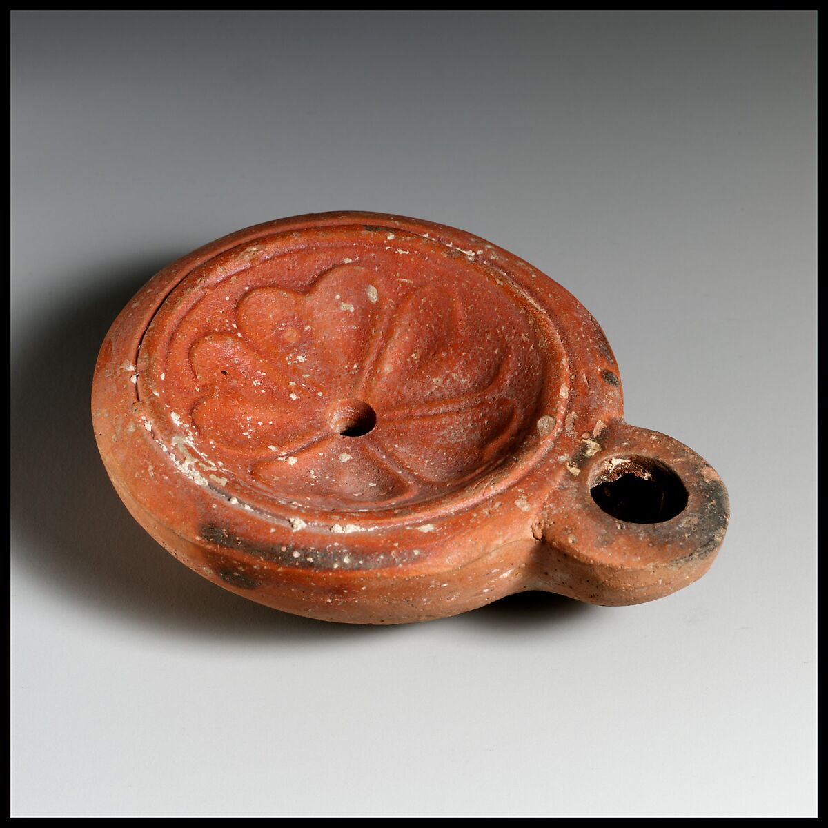 Terracotta oil lamp, Terracotta, Roman, Cnidian