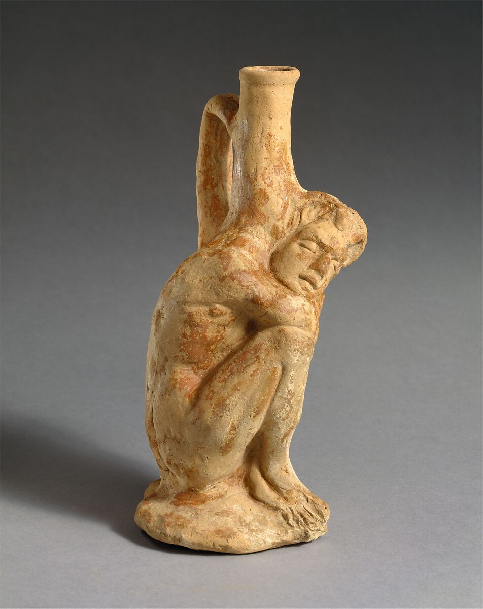 Terracotta vase in the form of a sleeping Black African youth