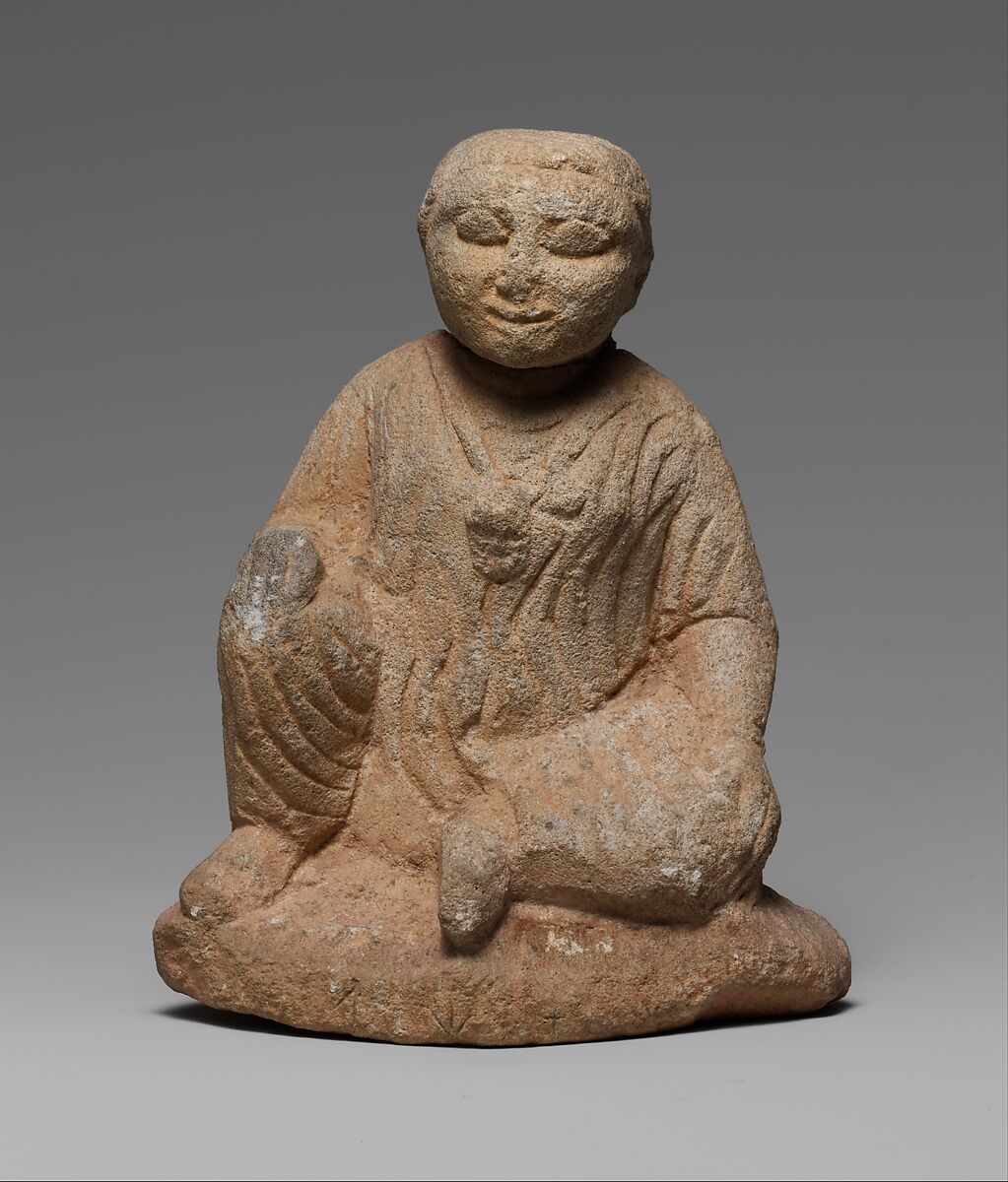 Limestone statuette of a seated temple boy on an inscribed base, Limestone, Cypriot 