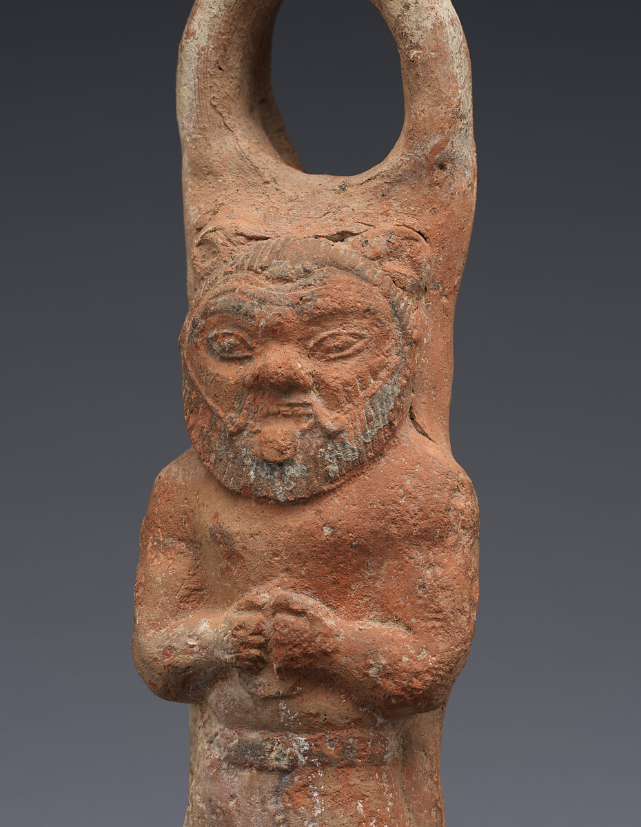 Terracotta lamp representing Bes, Terracotta, Cypriot