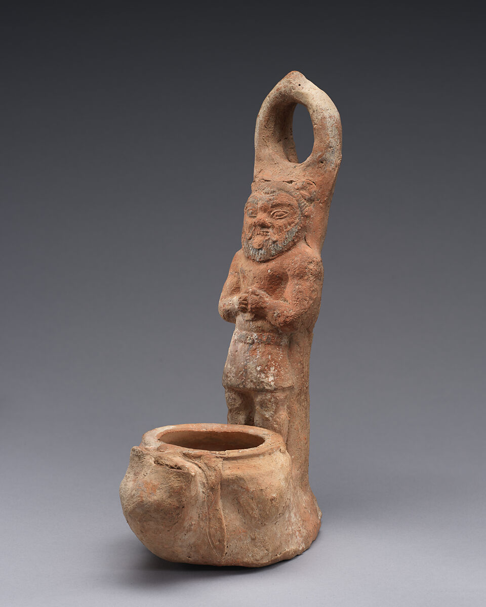 Terracotta lamp representing Bes, Terracotta, Cypriot