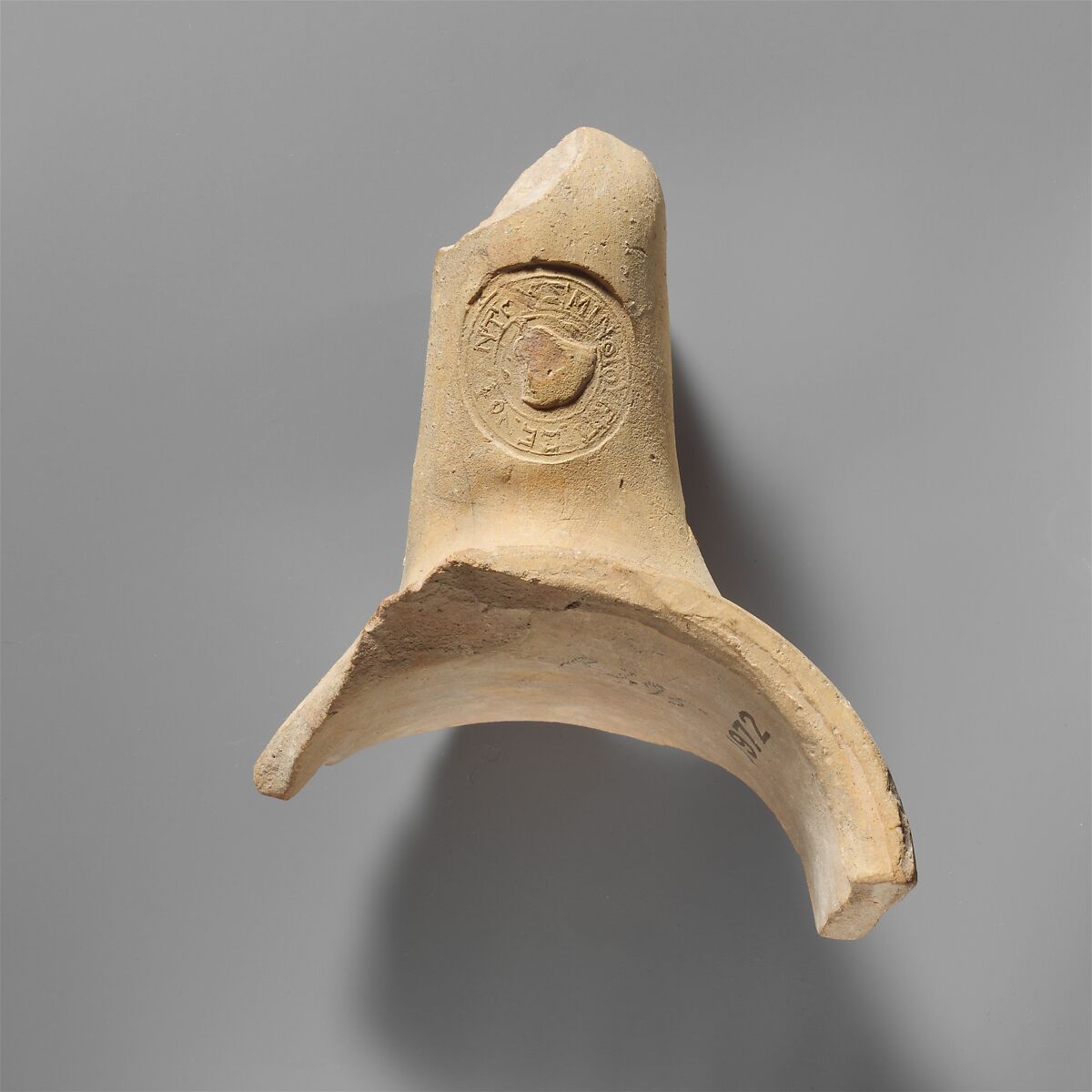Terracotta amphora fragment with stamped handle, Terracotta, Greek, Rhodian 