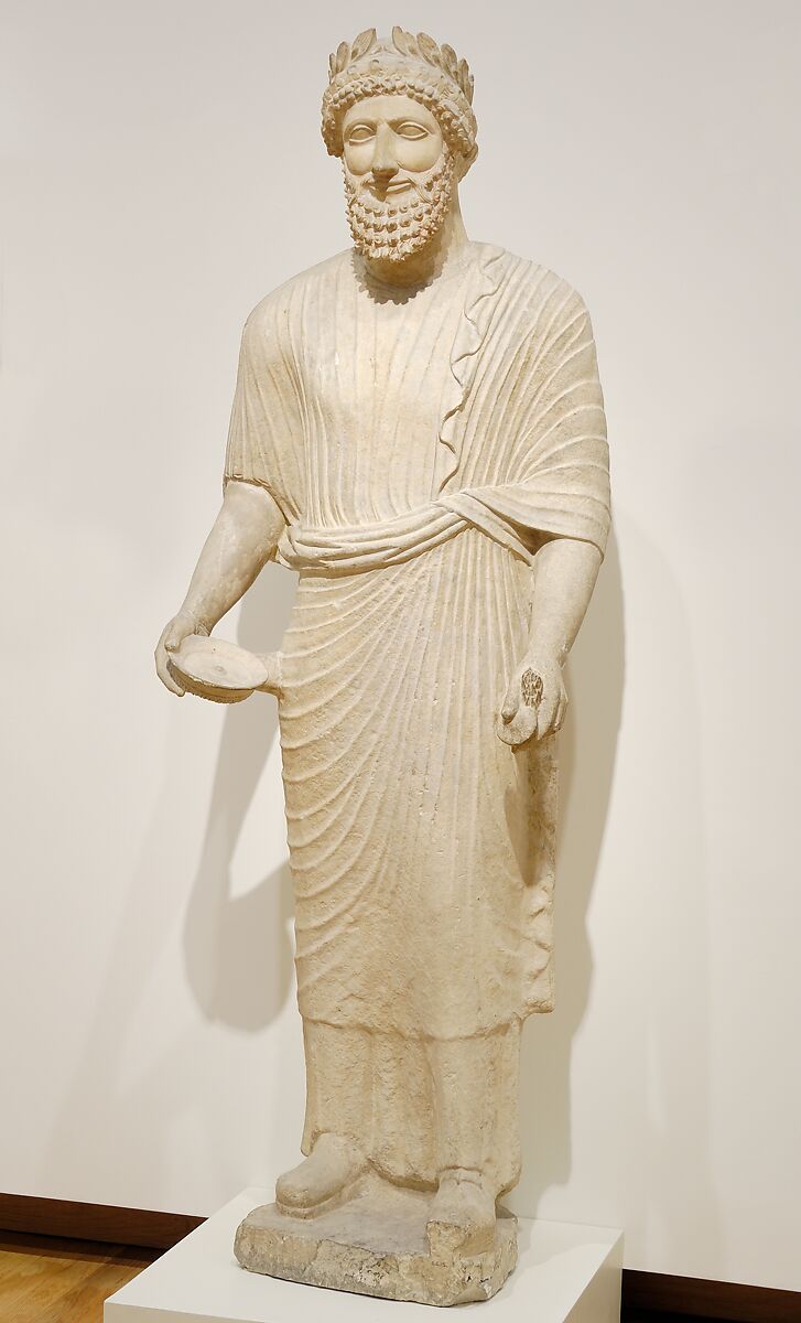 Limestone votary of a bearded male with a wreath, Limestone, Cypriot 