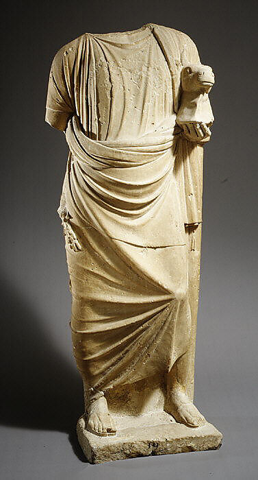 Limestone statue of a man holding a mask in the form of a bull's head, Limestone, Cypriot