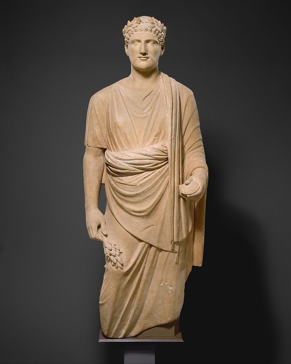 Limestone statue of a young man