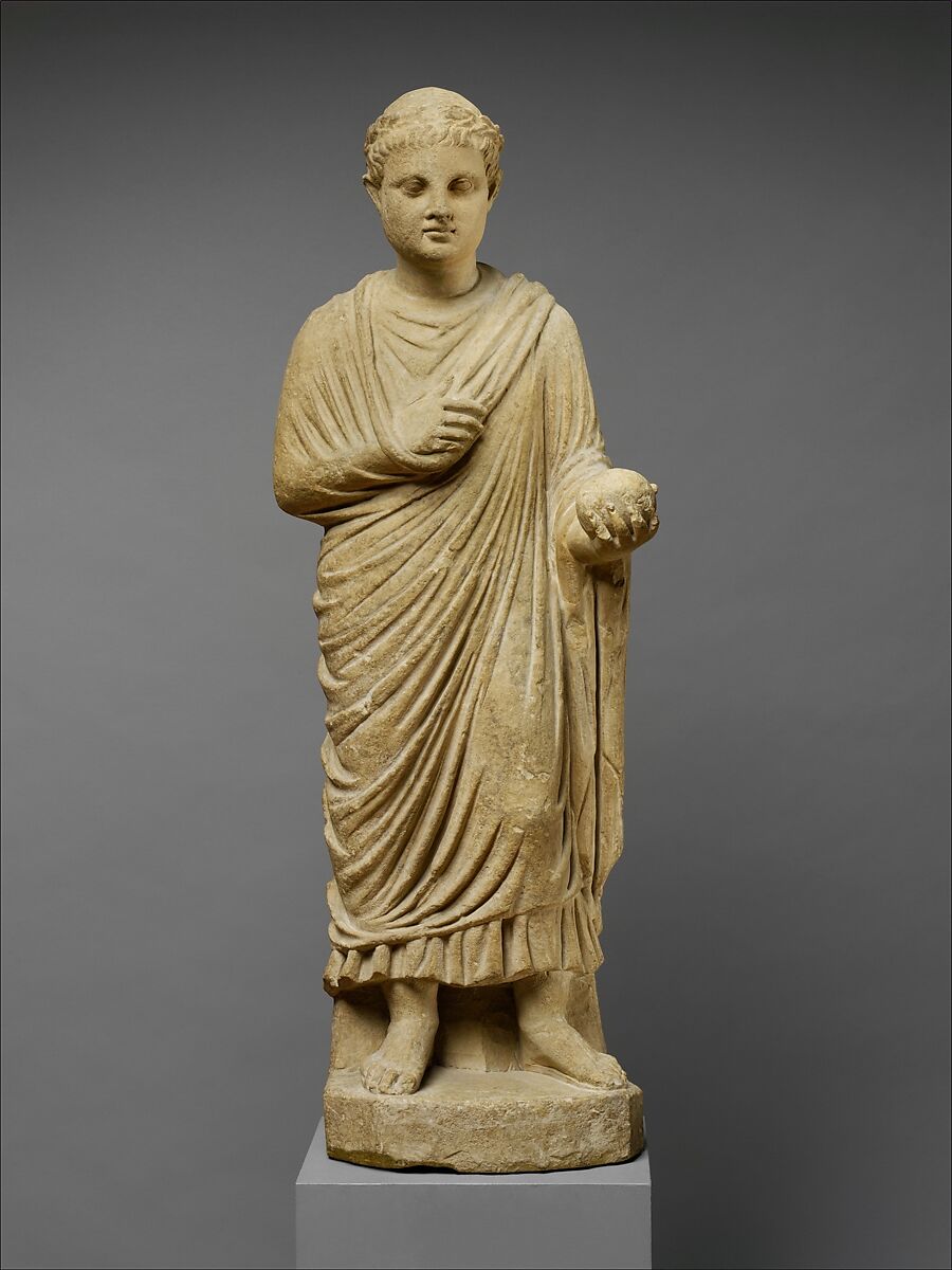 Limestone statue of a wreathed boy holding a ball or piece of fruit, Limestone, Cypriot 