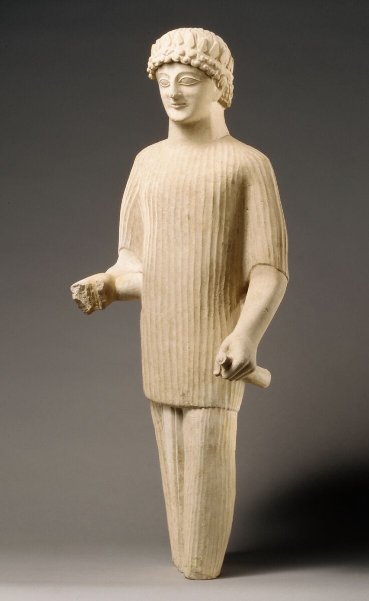 Limestone statue of a male votary wearing a wreath and long tunic, Limestone, Cypriot