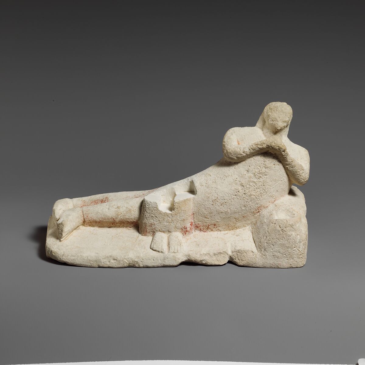 Limestone group of a male banqueter and a woman, Limestone, Cypriot 