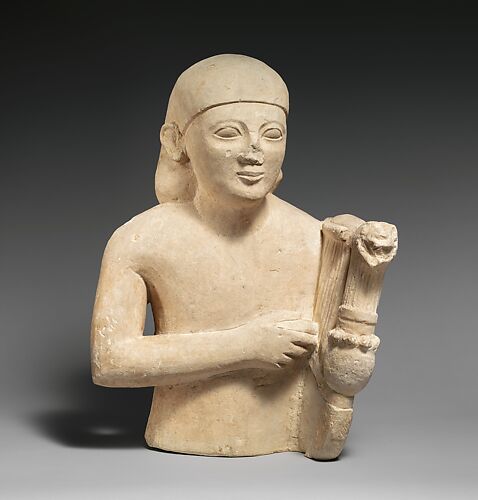 Limestone bust of a lyre-player