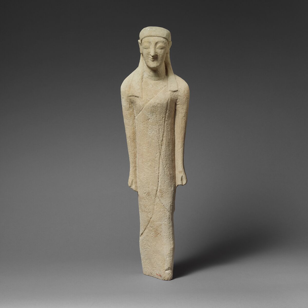 Limestone statuette of a beardless male votary in Greek dress, Limestone, Cypriot 