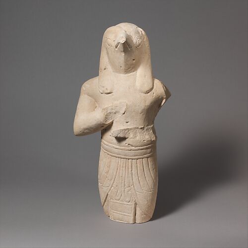 Limestone statuette of a male figure with Egyptianizing features