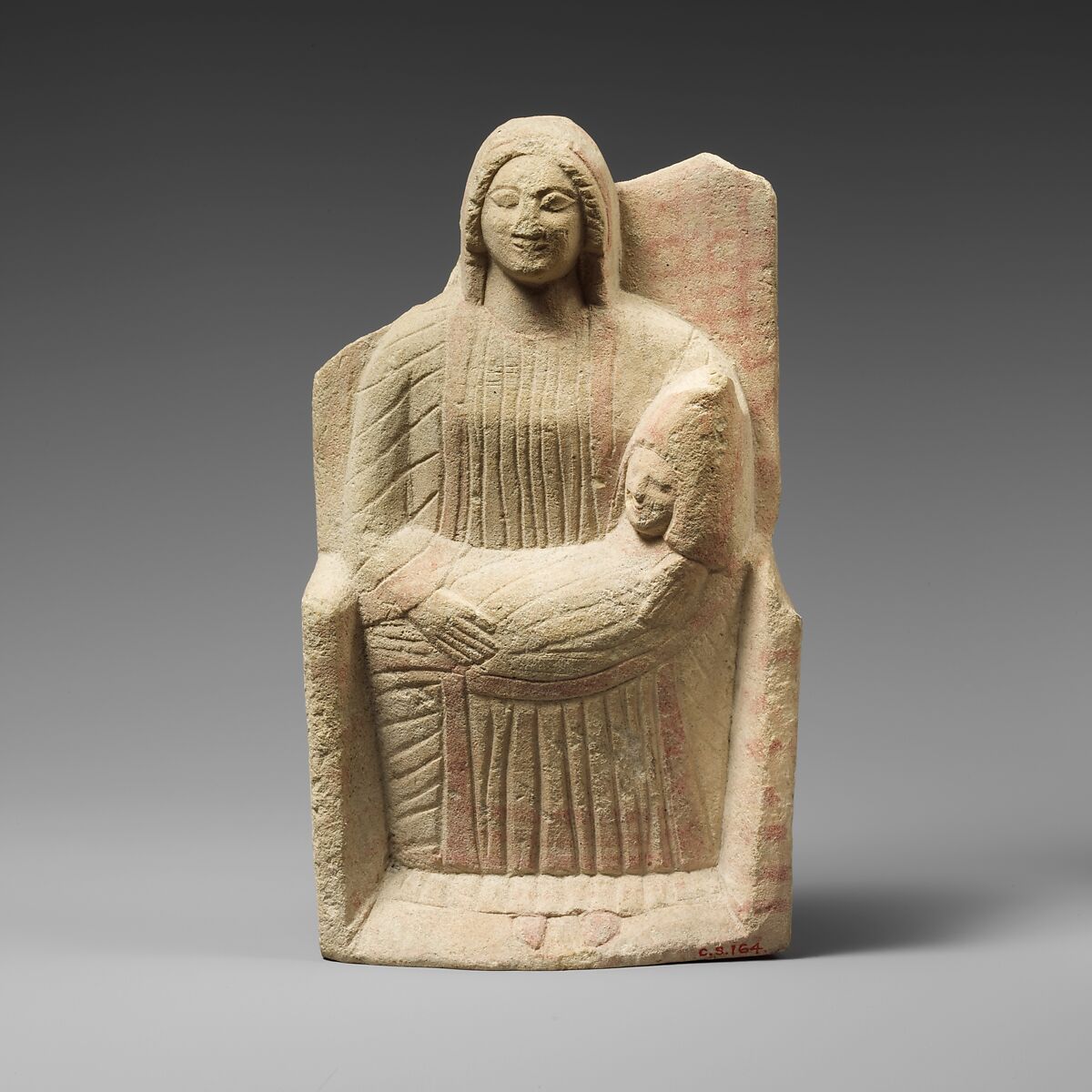 Seated limestone kourotrophos, Limestone, Cypriot 