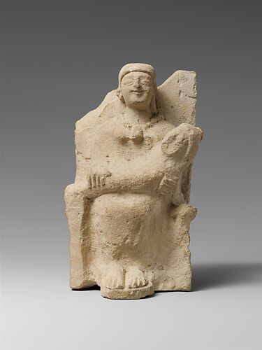 Limestone statuette of a nursing mother