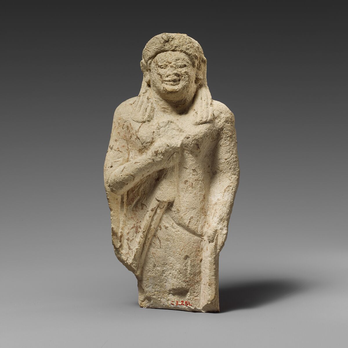 Limestone statuette of a female votary of the kore type, Limestone, Cypriot 