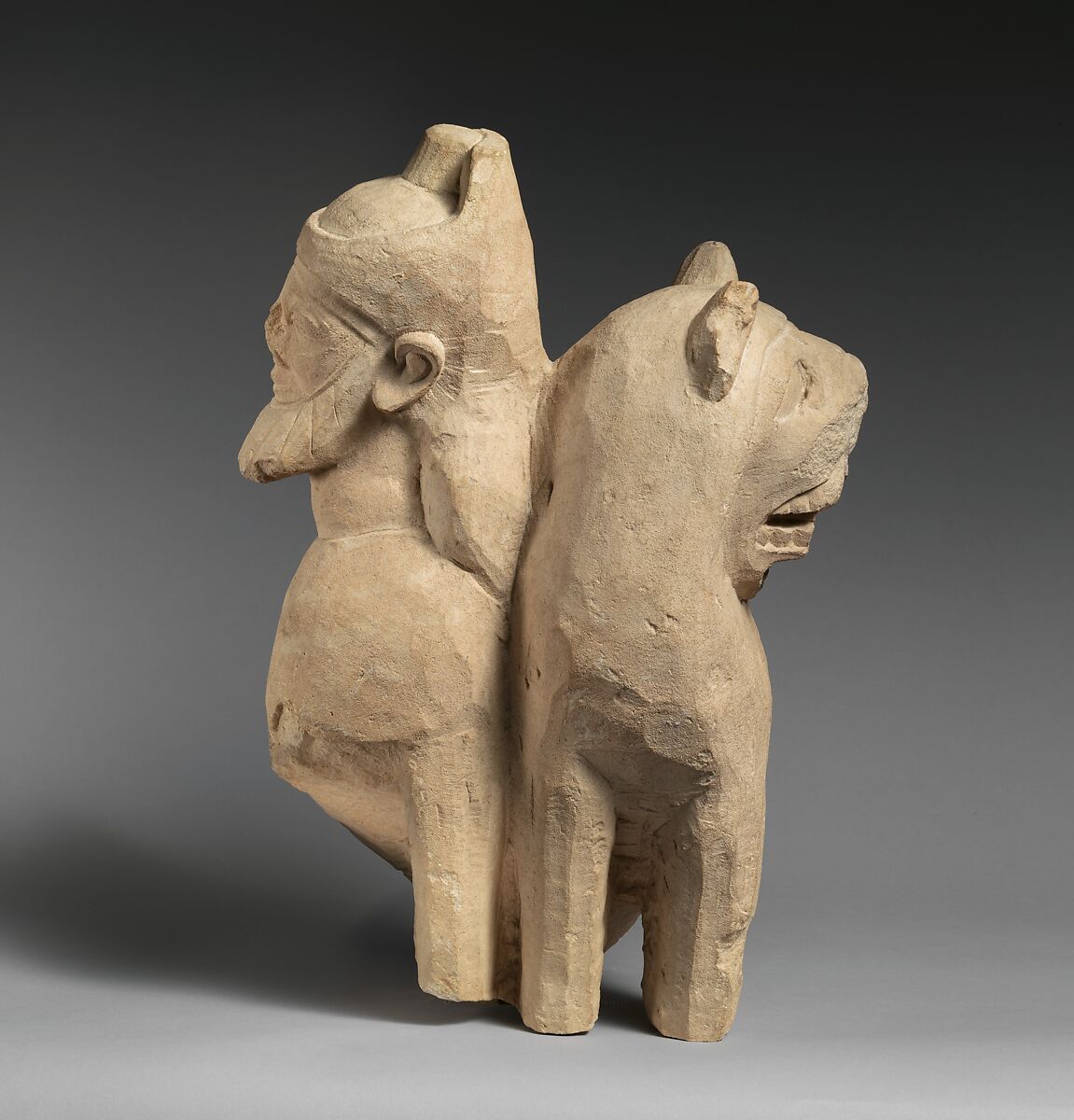 Limestone finial of a votive stele (?) with a lion and a male sphinx, Limestone, Cypriot