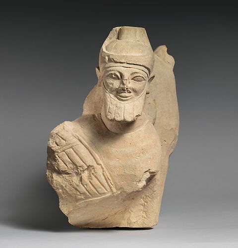 Limestone finial of a votive stele (?) with a lion and a male sphinx