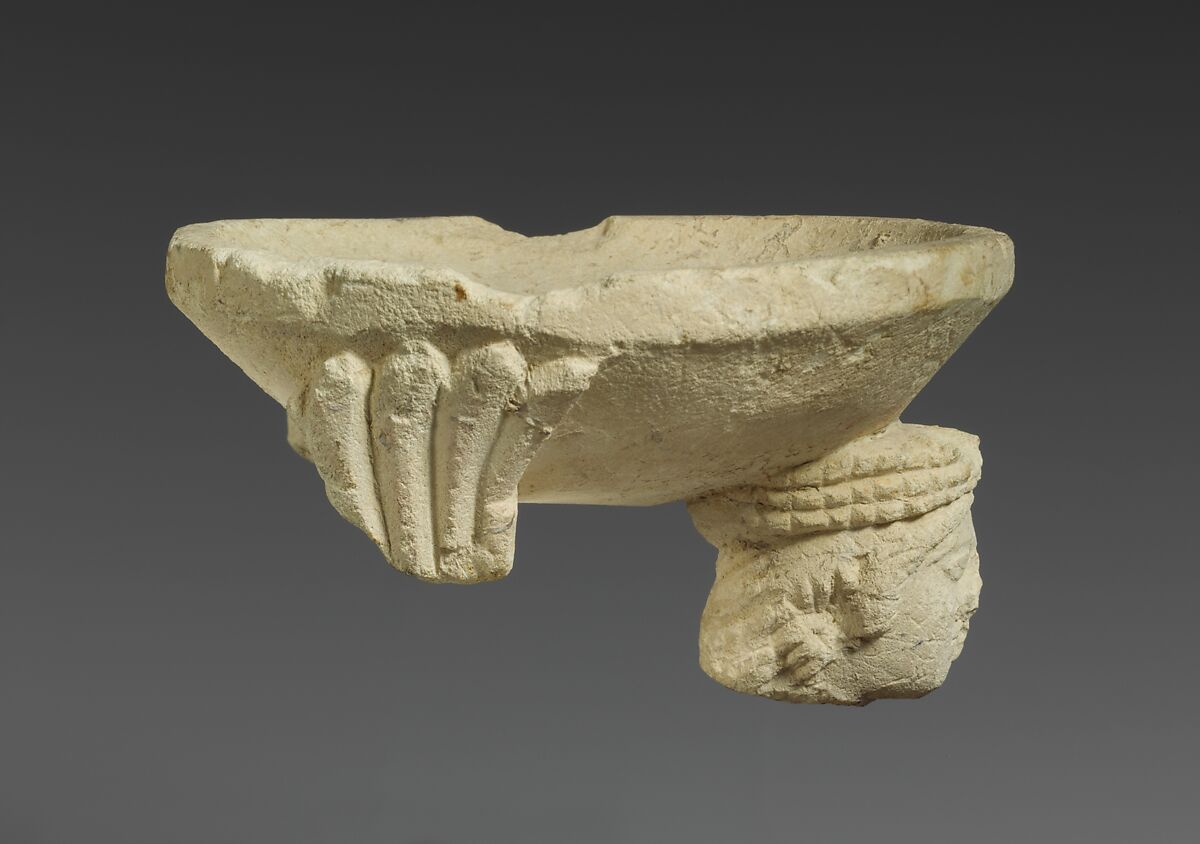 Limestone fragment of a sphinx supporting an incense burner, Limestone, Cypriot 