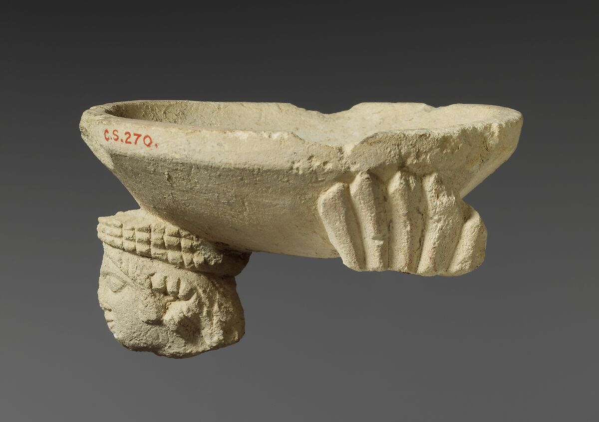 Limestone fragment of a sphinx supporting an incense burner, Limestone, Cypriot