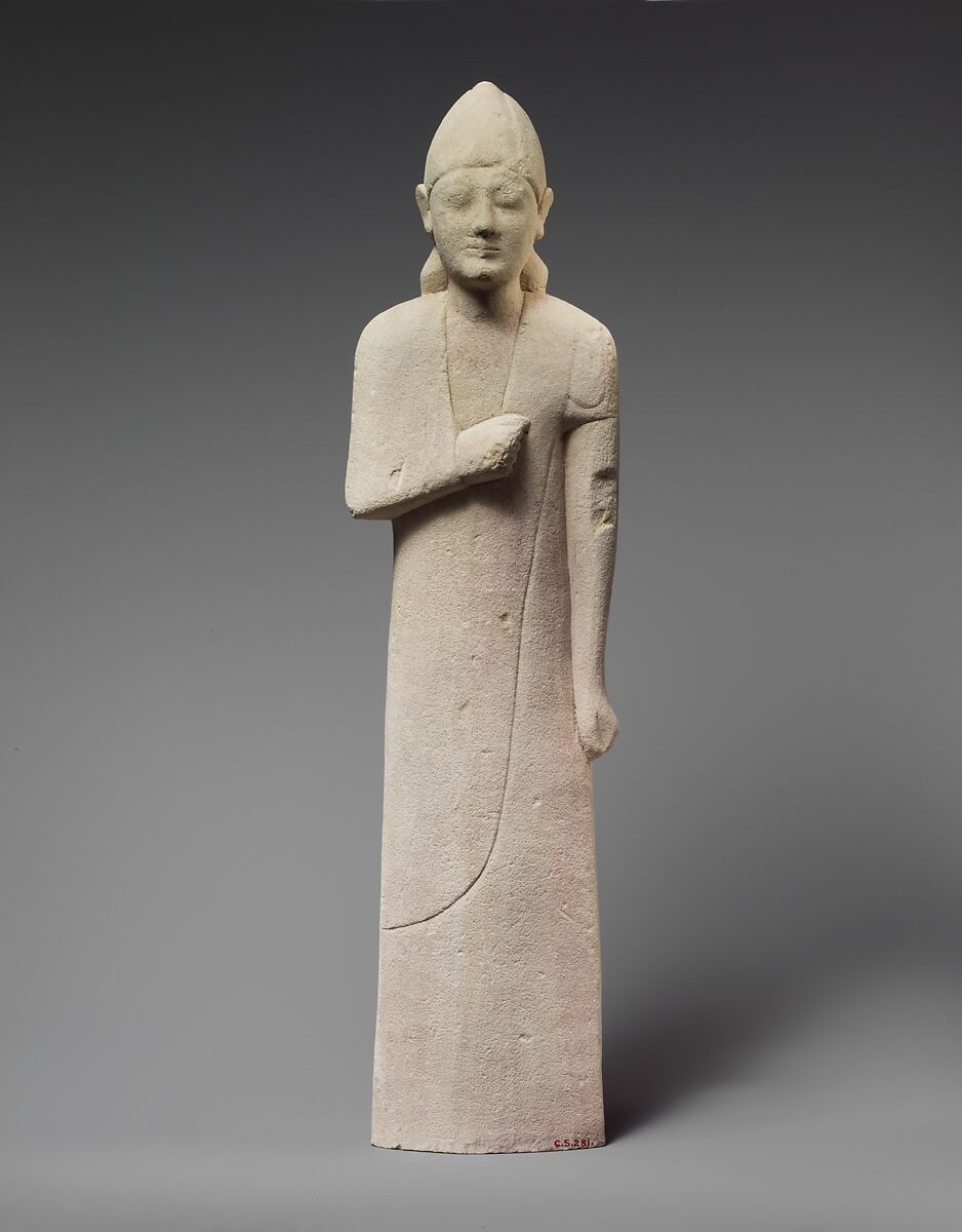 Limestone statuette of a beardless male votary with a conical helmet, Limestone, Cypriot