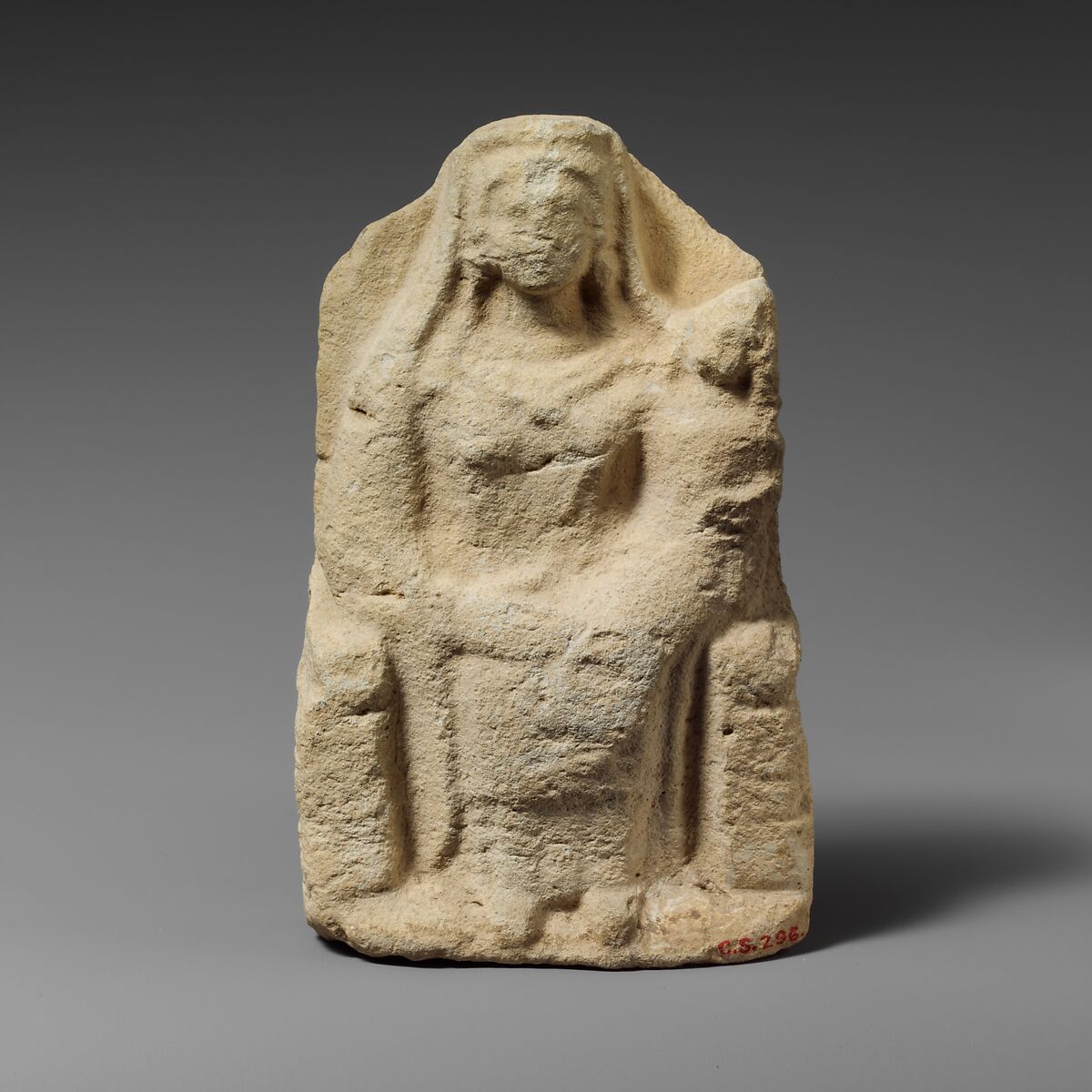 Seated limestone kourotrophos, Limestone, Cypriot 