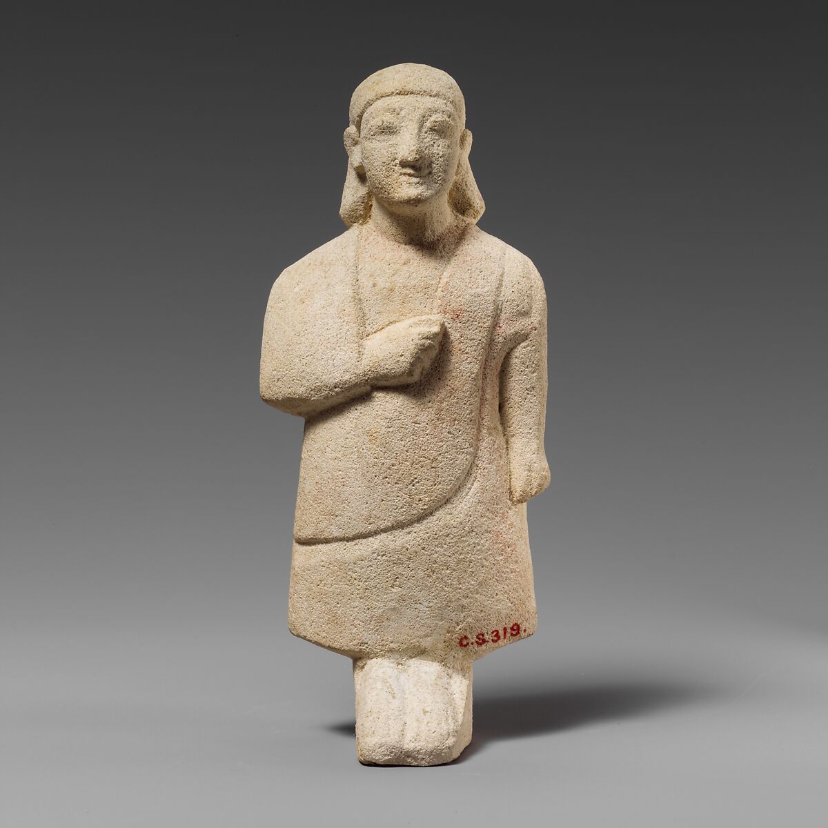 Limestone statuette of a male votary with a plain headdress, Limestone, Cypriot 