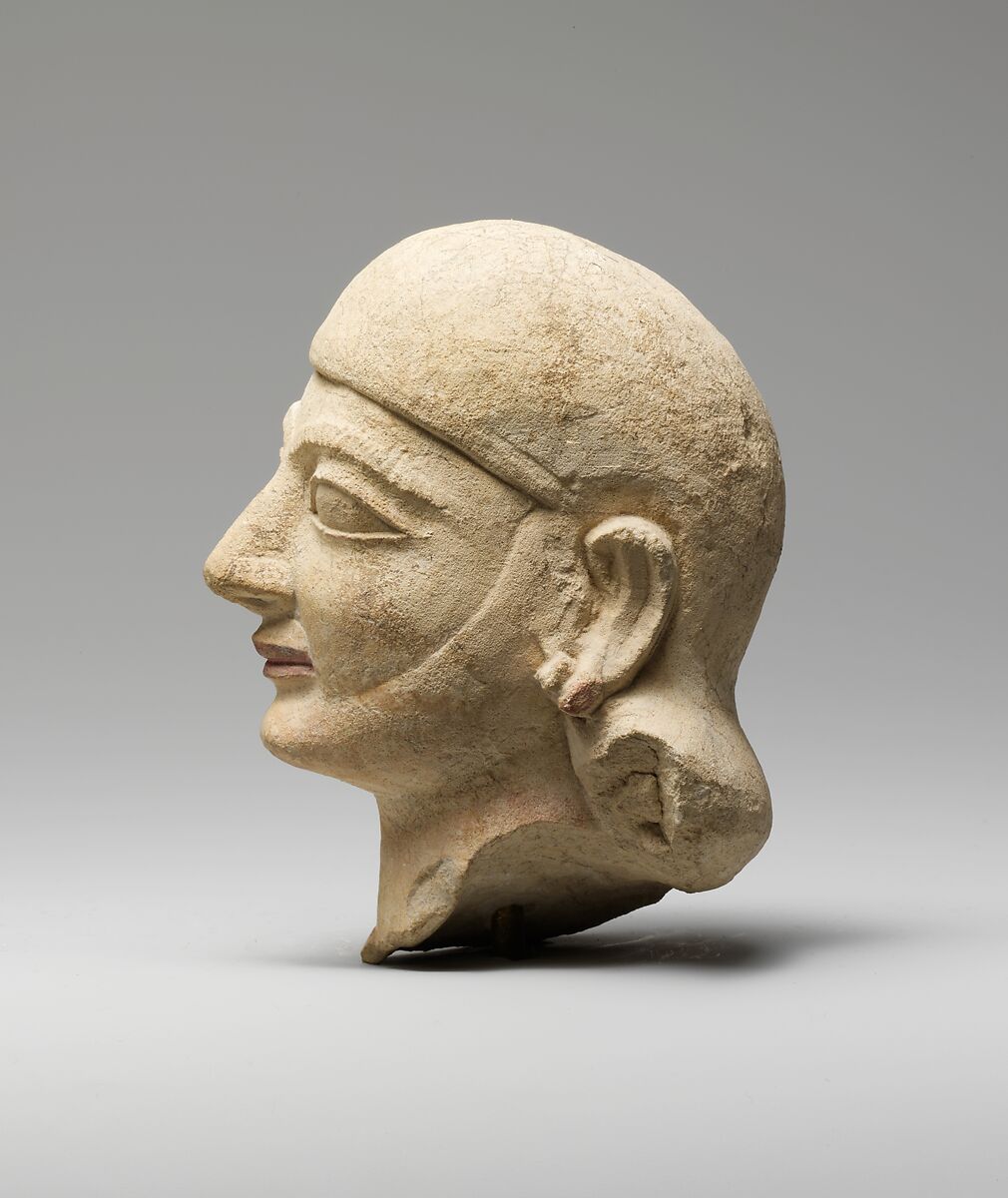 Limestone head of a man with a plain headdress, Limestone, Cypriot