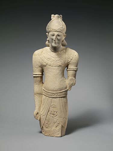 Limestone male figure in Egyptian dress