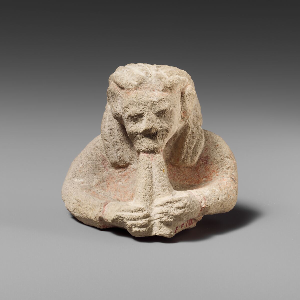 Upper part of a limestone male aulos player, Limestone, Cypriot 