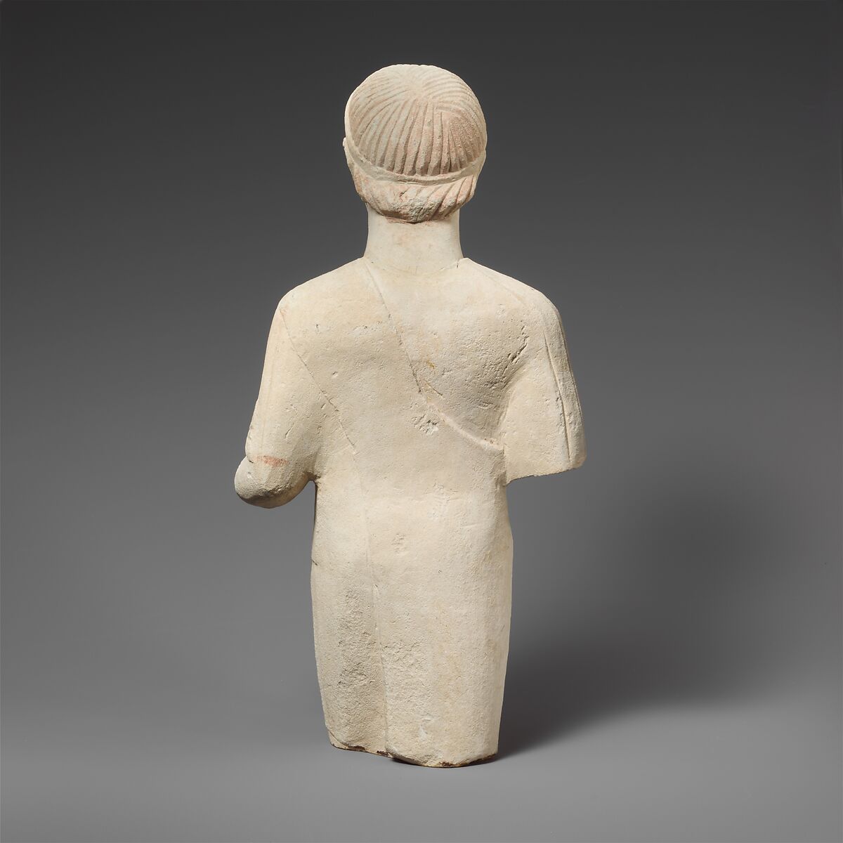 Limestone statuette of a beardless male votary with a diadem, Limestone, Cypriot