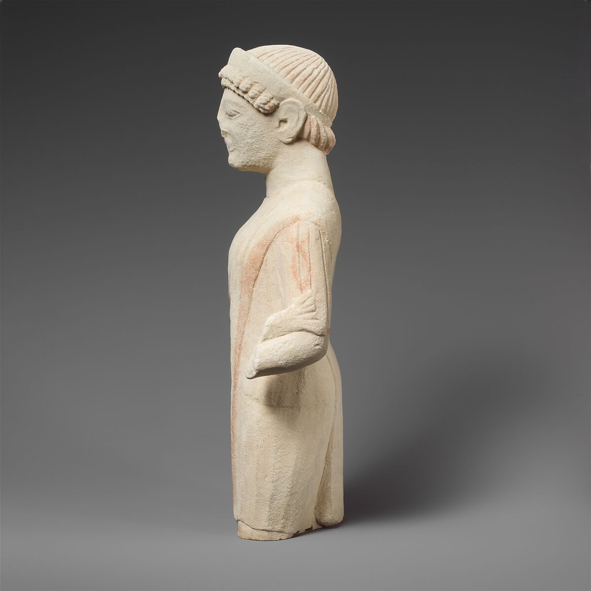 Limestone statuette of a beardless male votary with a diadem, Limestone, Cypriot