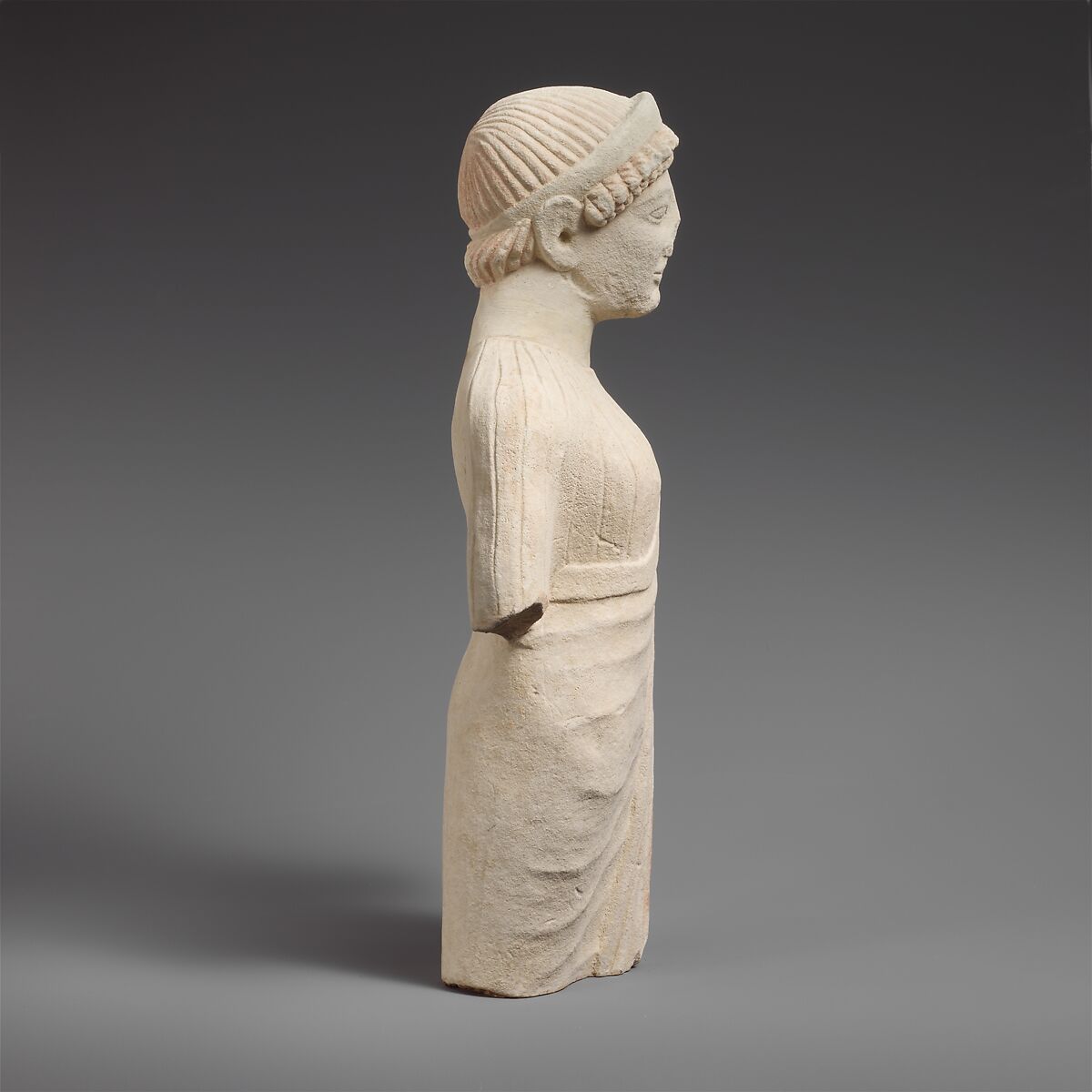 Limestone statuette of a beardless male votary with a diadem, Limestone, Cypriot