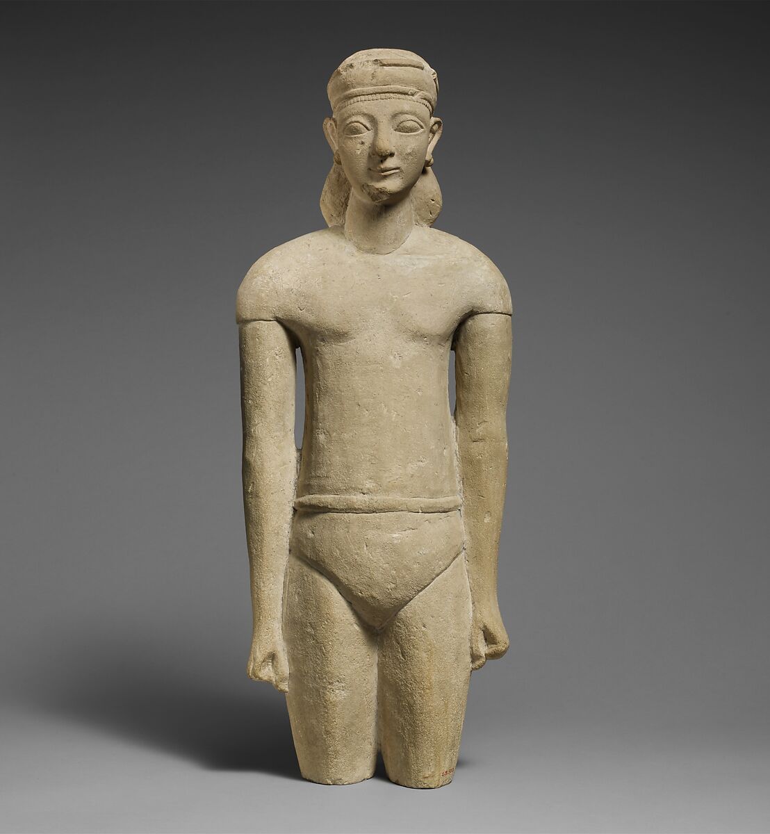 Limestone statuette of a male votary with Cypriot shorts and a diadem, Limestone, Cypriot 