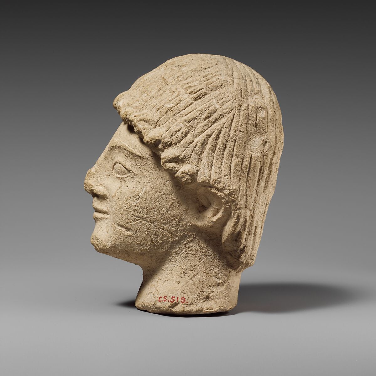 Limestone head of a beardless male votary, Limestone, Cypriot