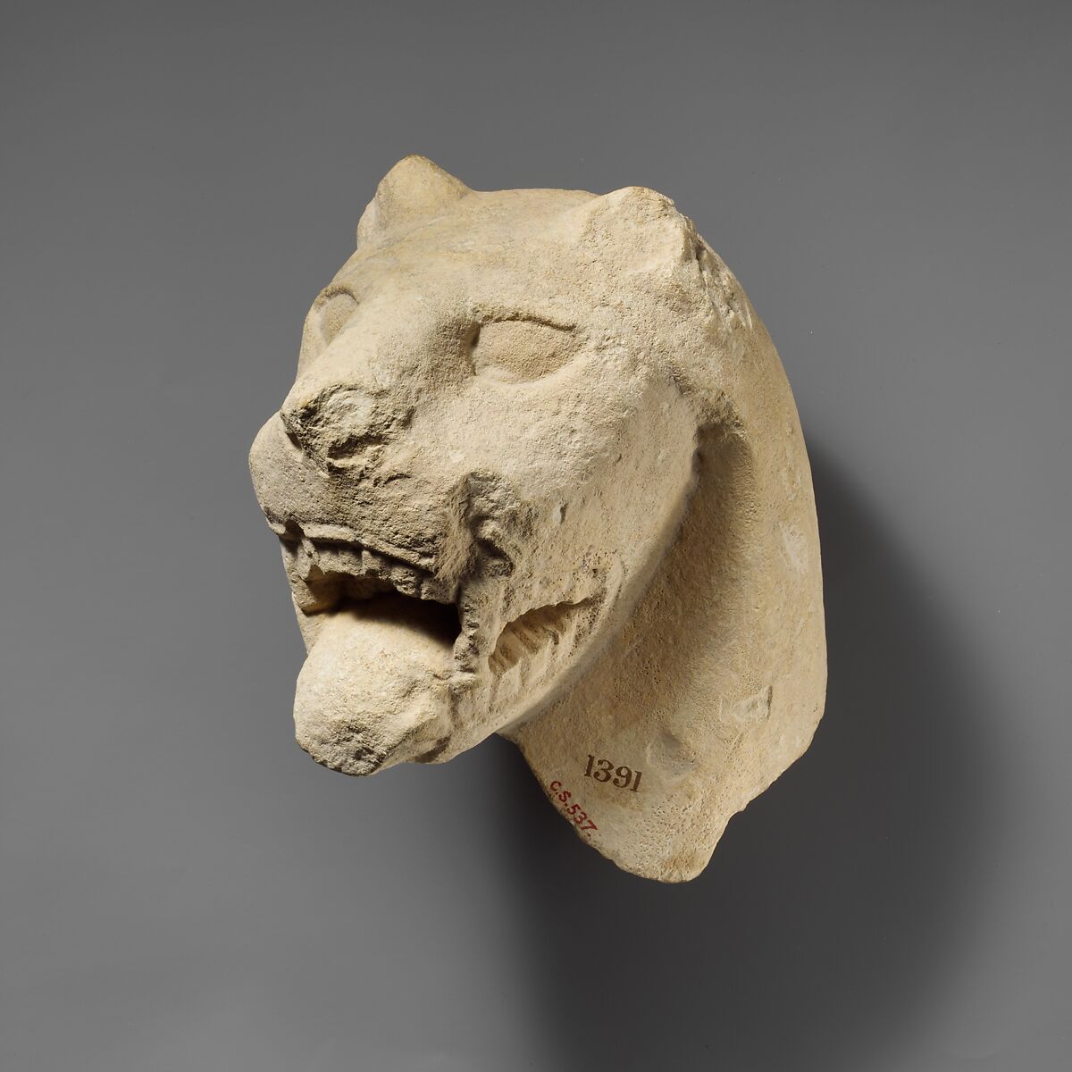 Limestone head of a lion from a votive stele (?), Limestone, Cypriot 