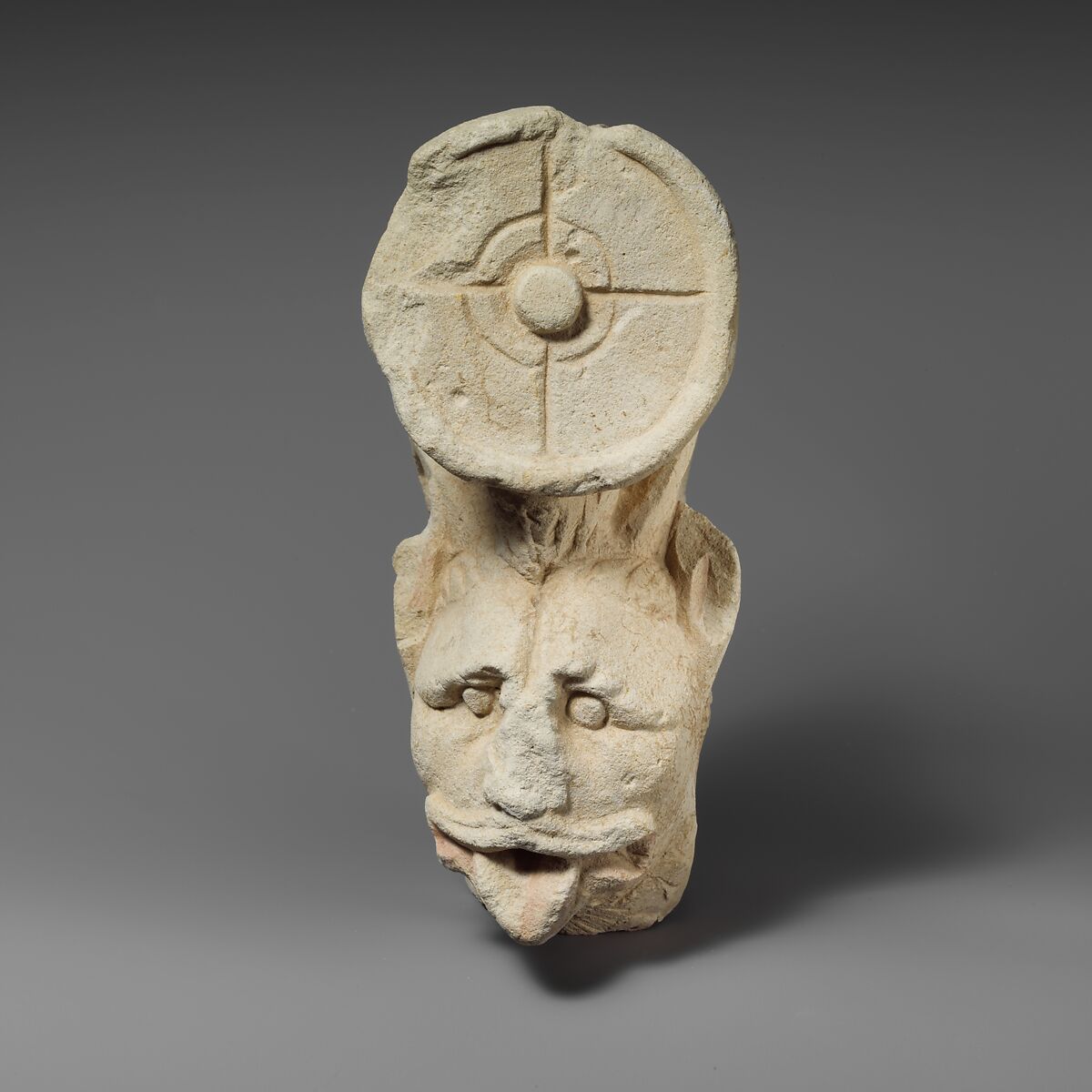 Fragment of a limestone throne (?) with the head of a horned lion, Limestone, Cypriot 