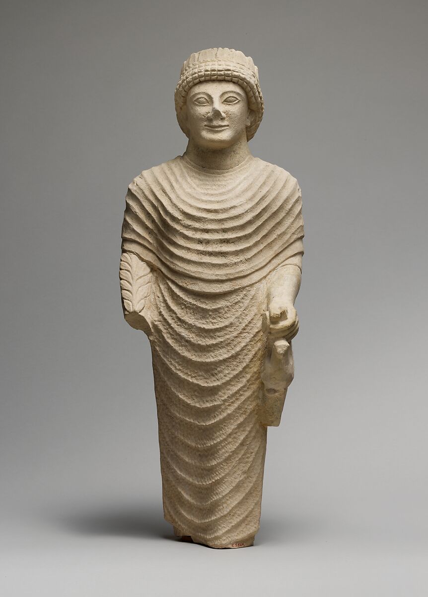 Limestone statue of a male votary holding a bird in the left hand, Limestone, Cypriot 