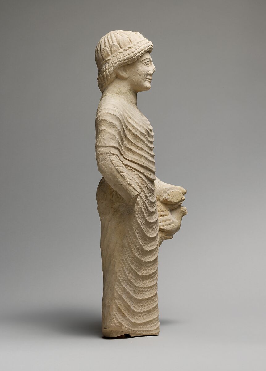 Limestone statue of a male votary holding a bird in the left hand, Limestone, Cypriot