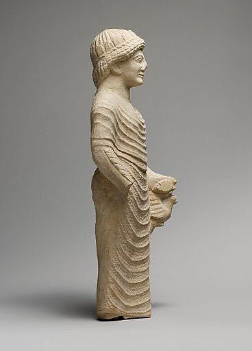 Limestone statue of a male votary holding a bird in the left hand, Limestone, Cypriot