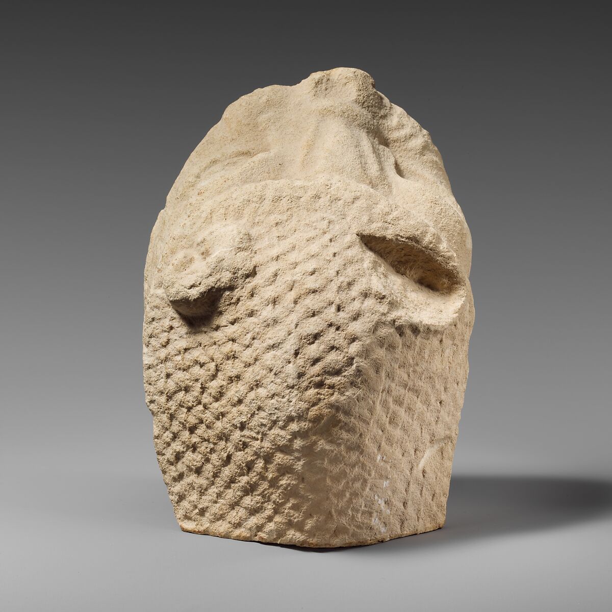 Limestone head of Herakles wearing the lion skin, Limestone, Cypriot