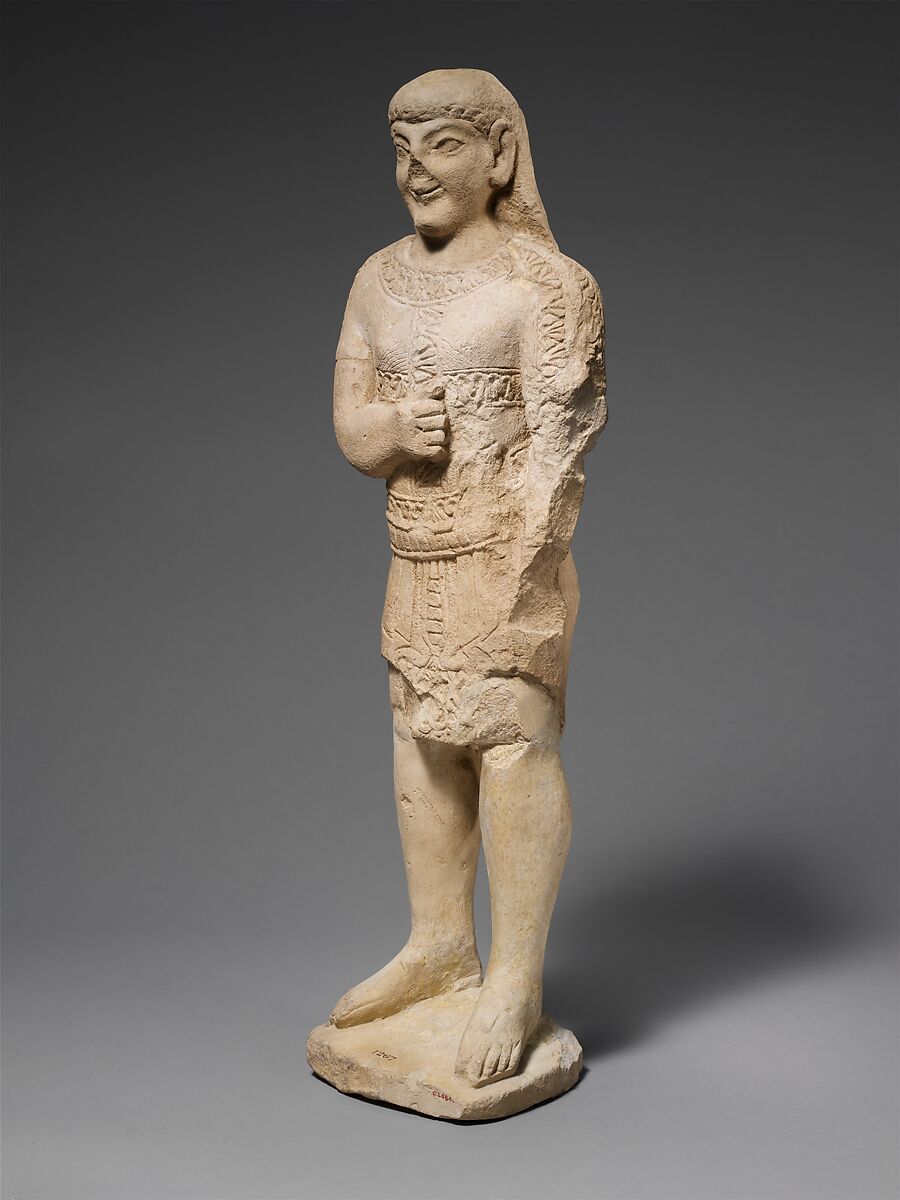 Limestone statuette of a beardless male votary in Egyptianizing dress, Limestone, Cypriot