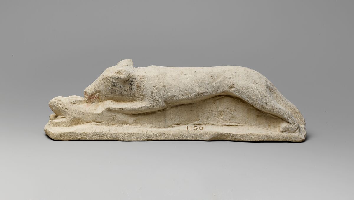 Limestone votive statuette of a hound seizing a hare, Limestone, Cypriot 