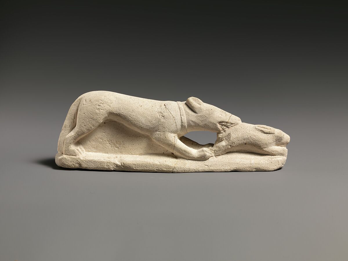 Limestone statuette of a coursing hound seizing a hare, Limestone, Cypriot 