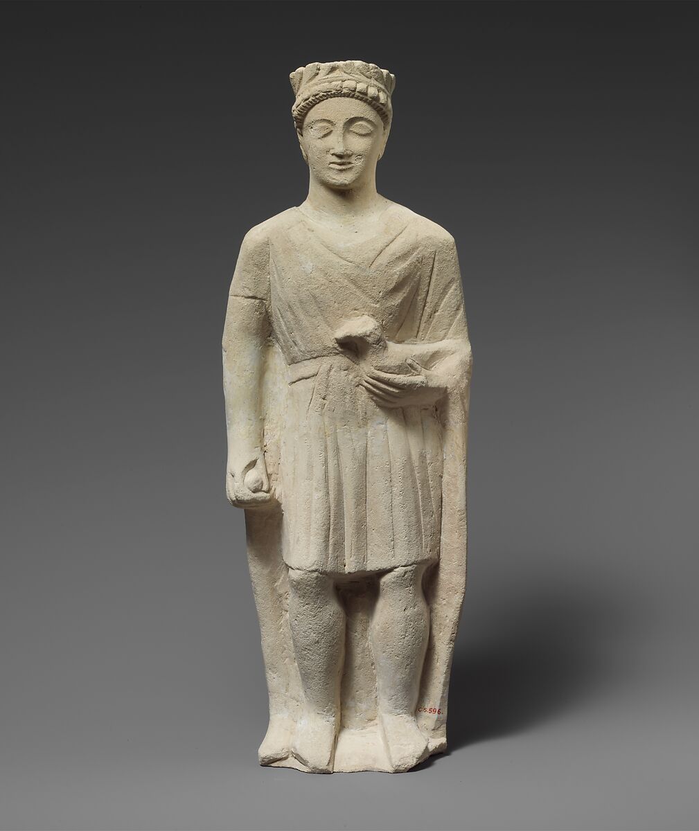 Limestone statuette of a beardless male votary holding a bird, Limestone, Cypriot 